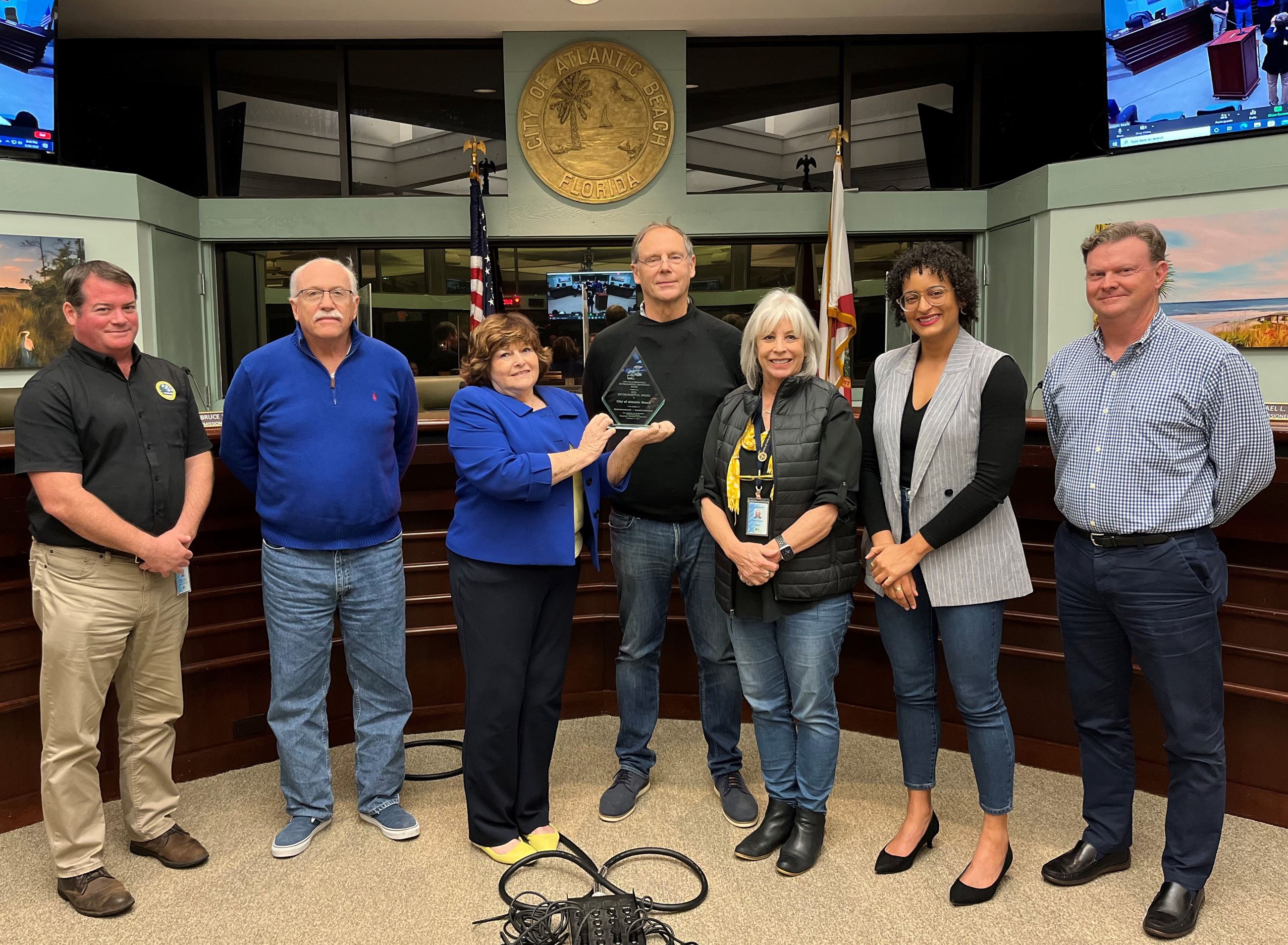 Photo of City Commission members accepting a 2021 City of Jacksonville Environmental award